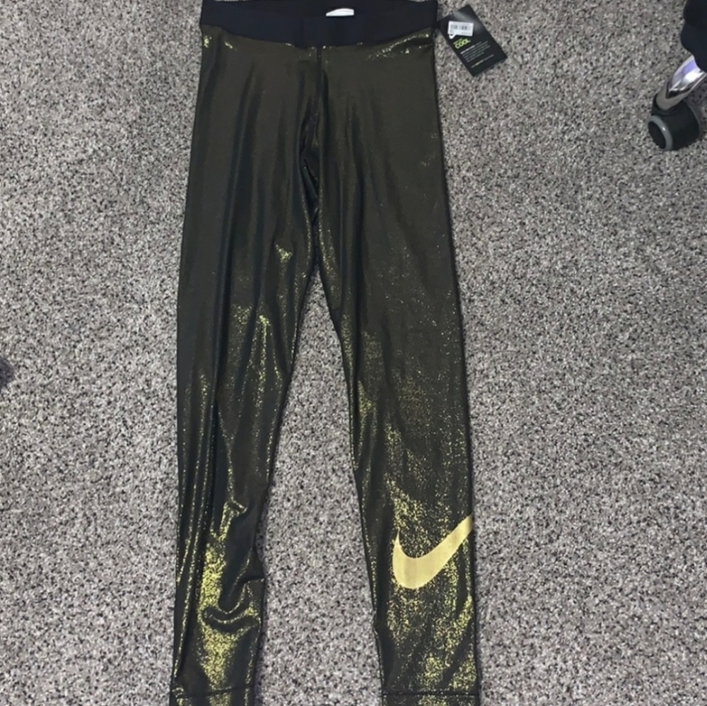 Nike womens gold running tights